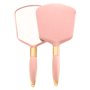 Espejo rosado vintaje con decoraciones oro